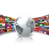 Continuing Commonwealth Support to Education: an urgent development priority abstract planet against a background of flags of the world