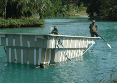 person rowing a swimming pool in a river