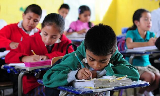 Children in their classroom in El Renacimiento school, in Villa Nueva, Guatemala
