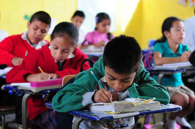 Children in their classroom in El Renacimiento school, in Villa Nueva, Guatemala