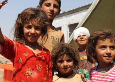 Group of children one with a bandage around his head