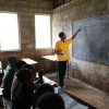 A rising tide of access: What consequences for inclusive learning and sustainable development in Ethiopia? Young teacher at a blackboard