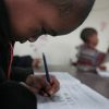 How much value do Value Added Models provide for the quality of schools? Child writing