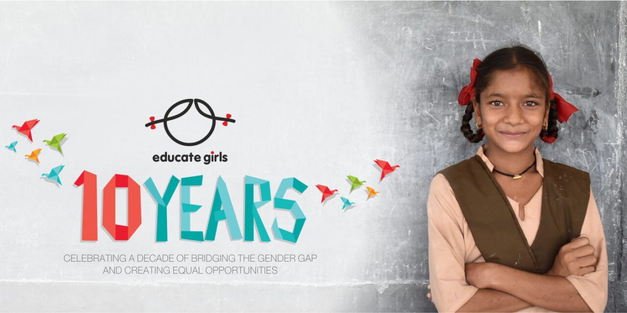 Girl smiling with her arms folded, Educate Girls 10 years briding the gender gap