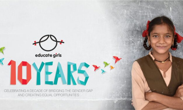 Girl smiling with her arms folded, Educate Girls 10 years briding the gender gap