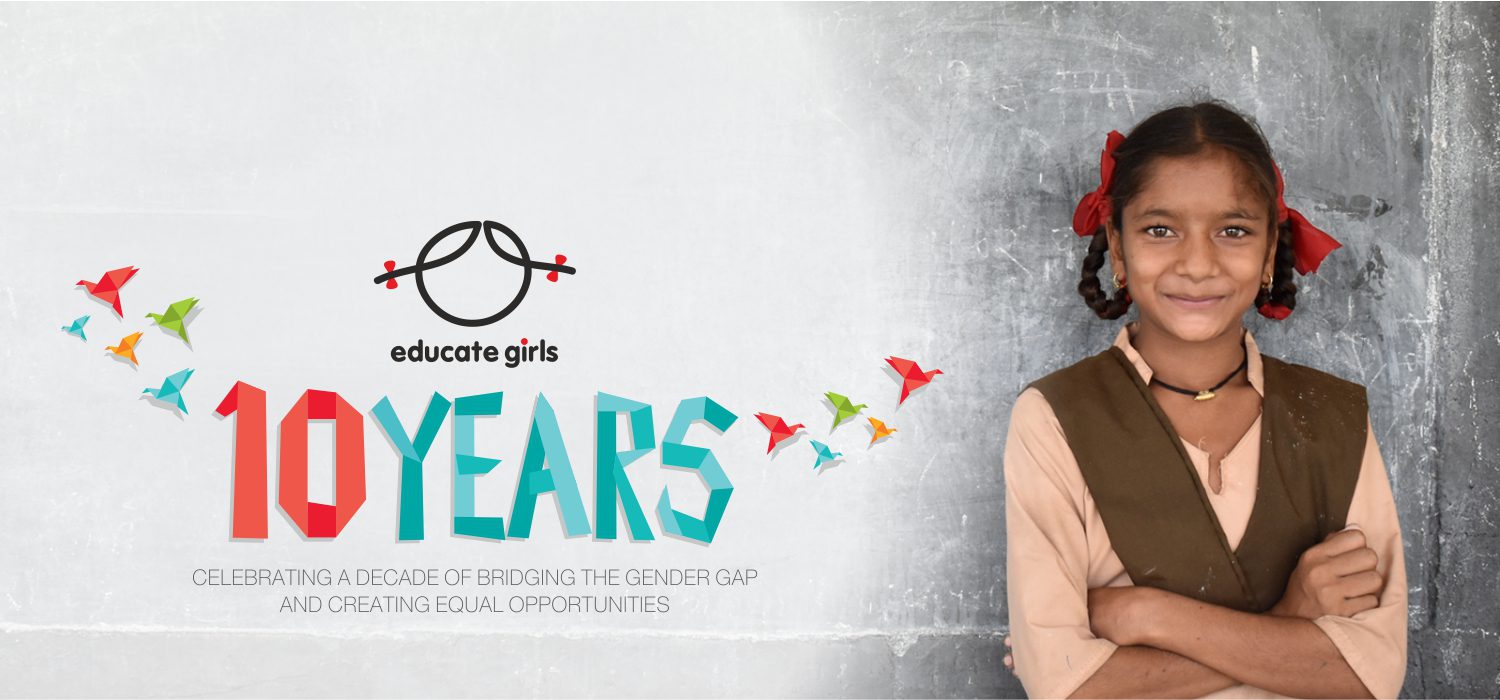 Girl smiling with her arms folded, Educate Girls 10 years briding the gender gap