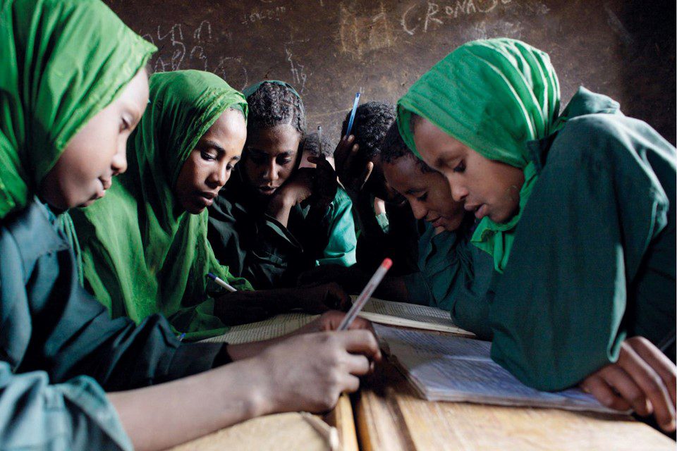 Girls working at their desks