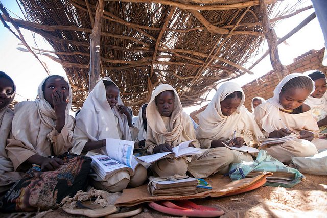 Students taking classes in one of the old rooms in poor conditions of the Al Salam Basic School for Girls in Kabkabiya,