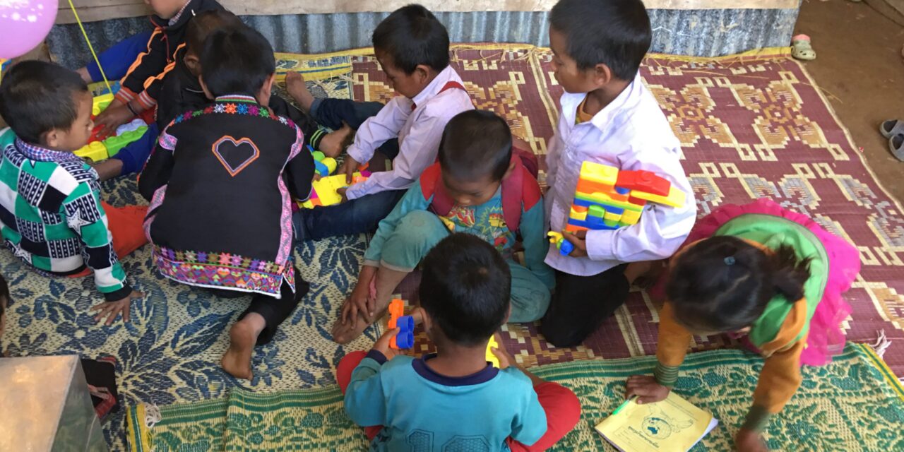 Pre- school children playing on the floor