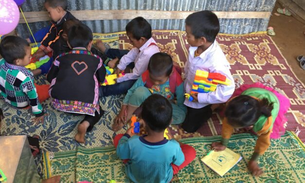 Pre- school children playing on the floor