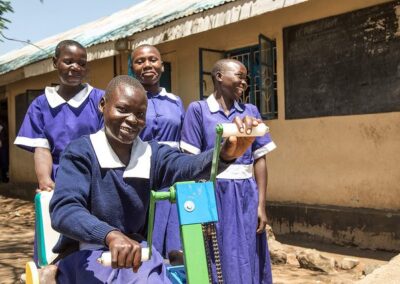 A disabled student with her class mates