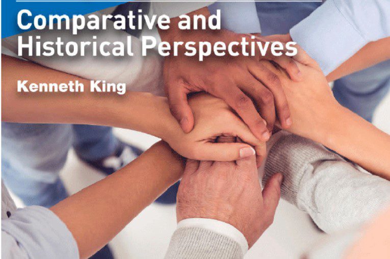 Book cover with hands piled on each other. Education Skills and International co-operation - Comparative and Historical perspectives by Kenneth King