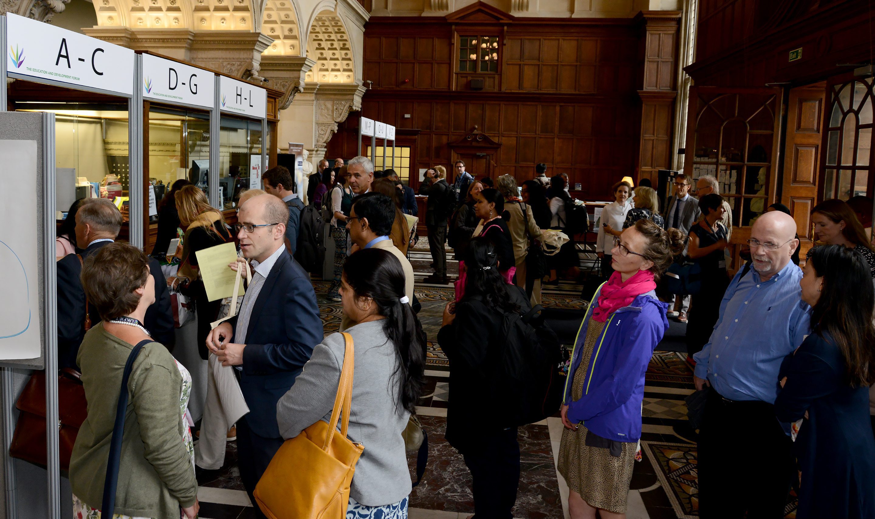 Delegates registering on arrival