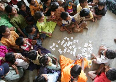 Children sitting on the floor of a classroom in Andhra Pradesh