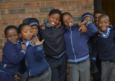 Group of happy smiling school boys