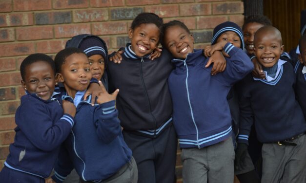 Group of happy smiling school boys