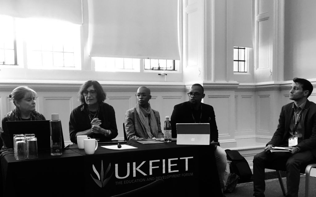 A presentation panel at the conference