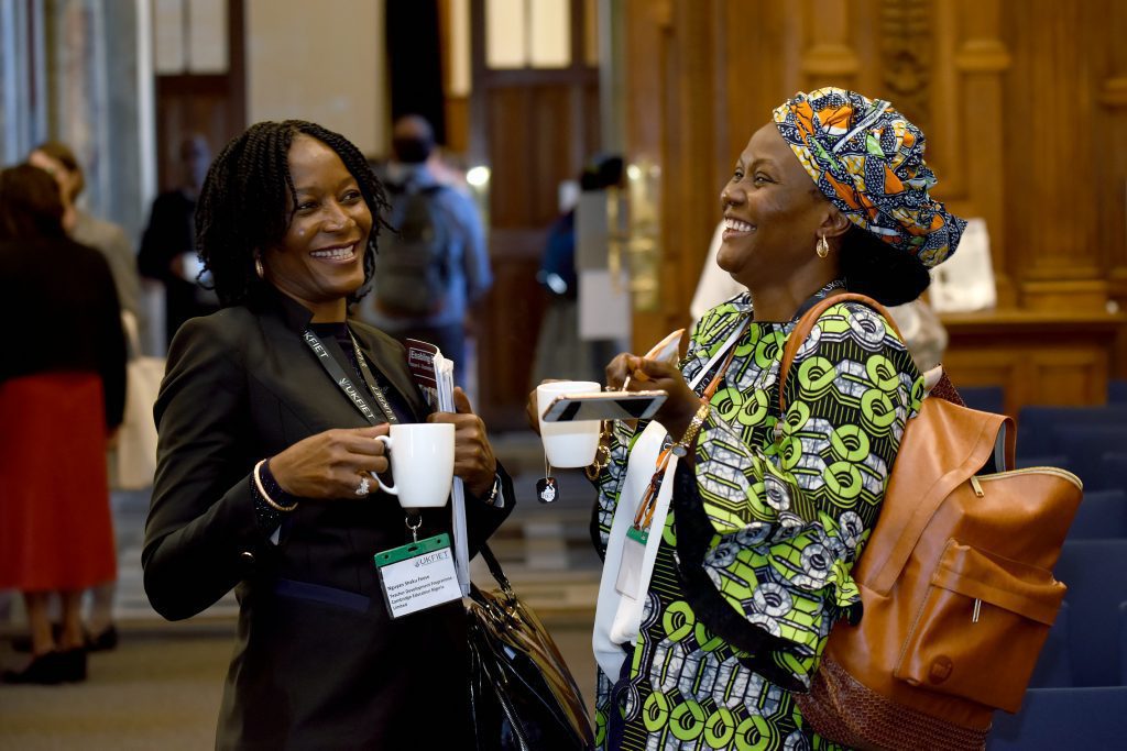 Delegates talking in coffee break 2019