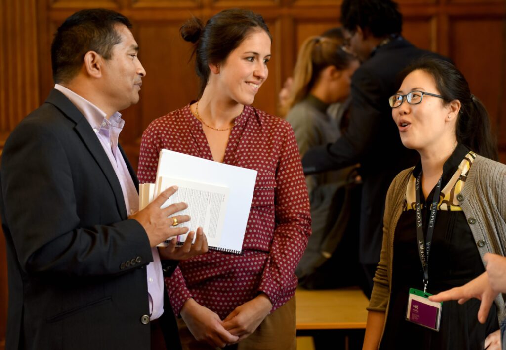 Delegates talking in coffee break 2019