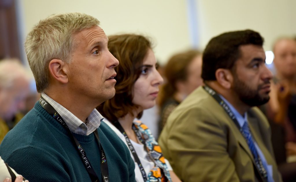 Delegates listening to a presentation 2019