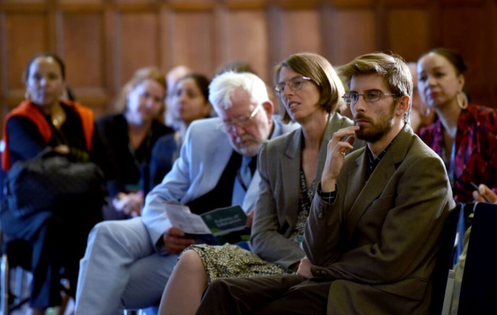 Delegates listening to a presentation 2019