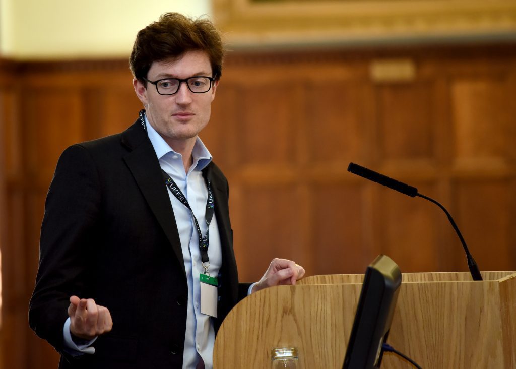 male presenter at the conference