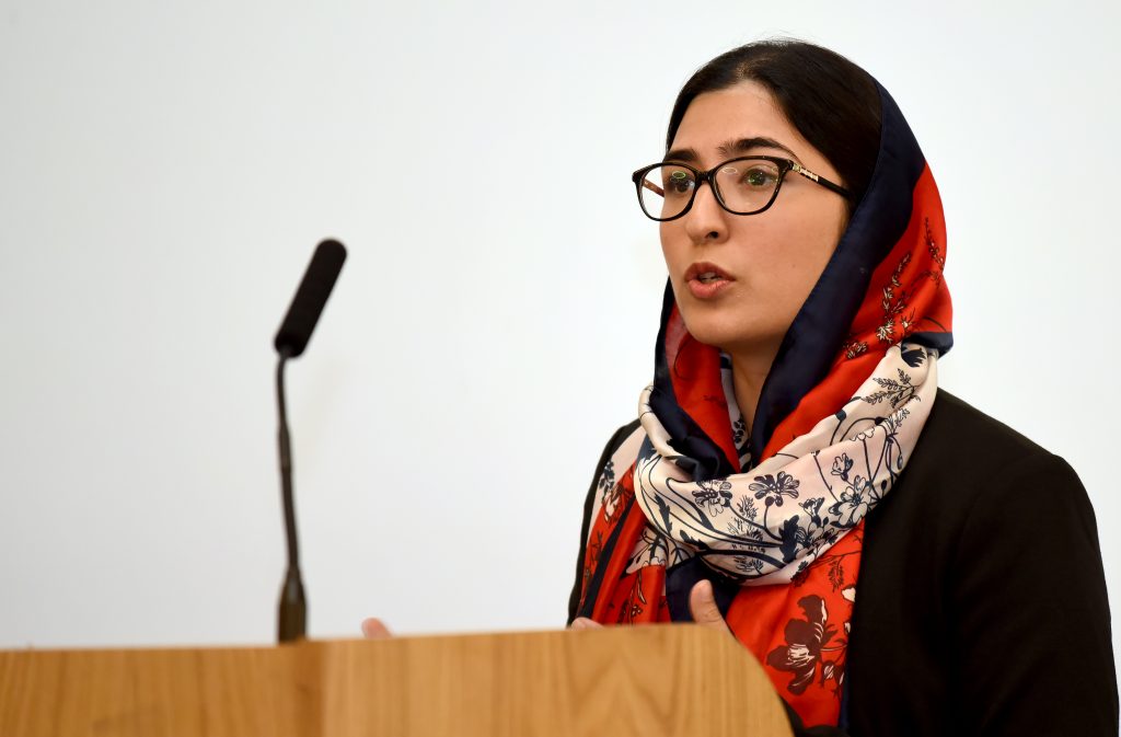 female presenter at the conference