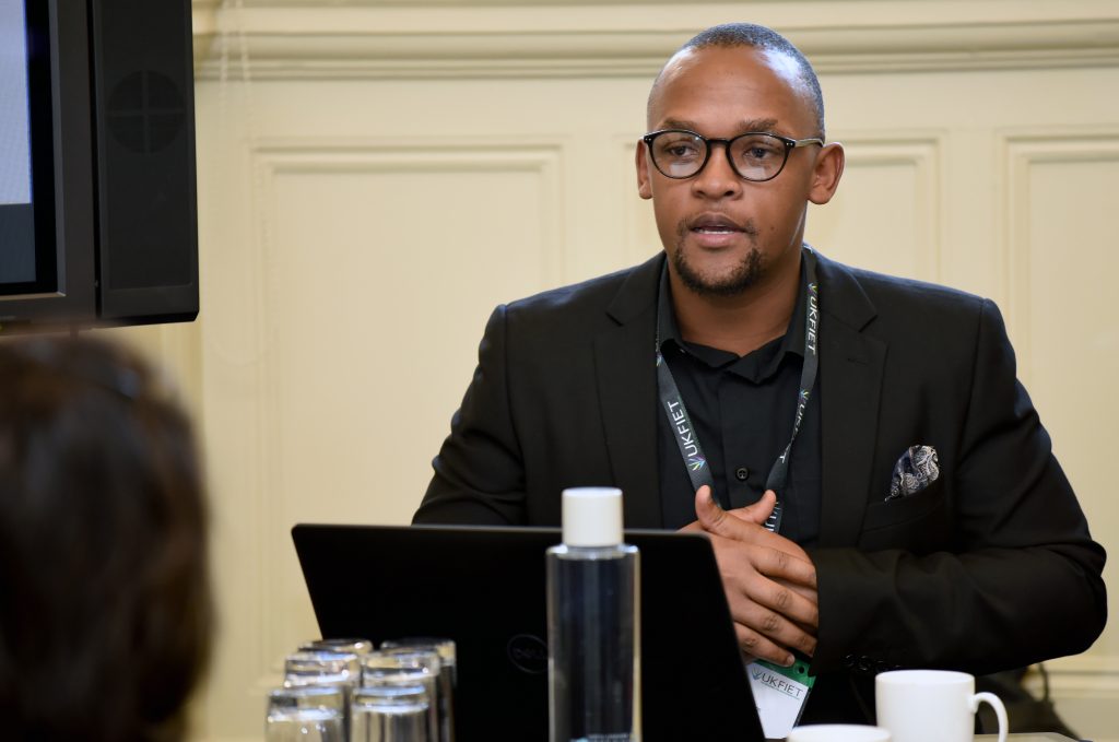 Male presenter at the conference