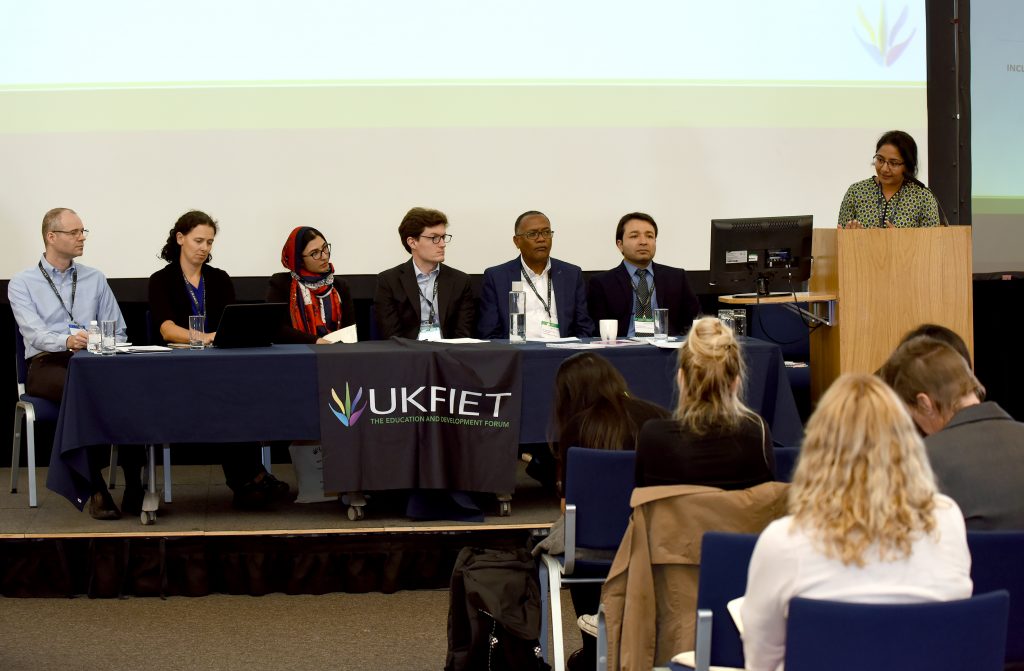 A presentation panel at the conference