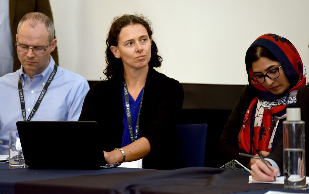 A female presenter at the conference