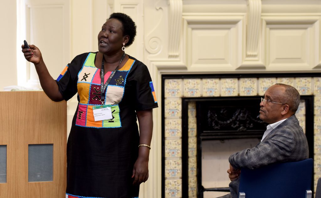 A female presenter at the conference