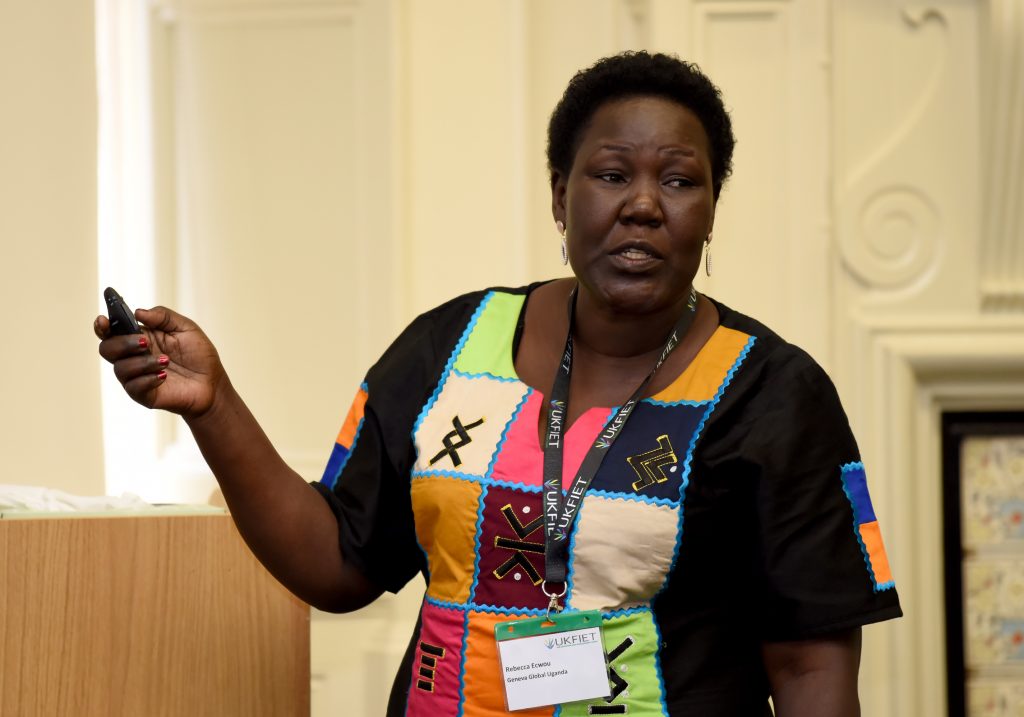 A female presenter at the conference