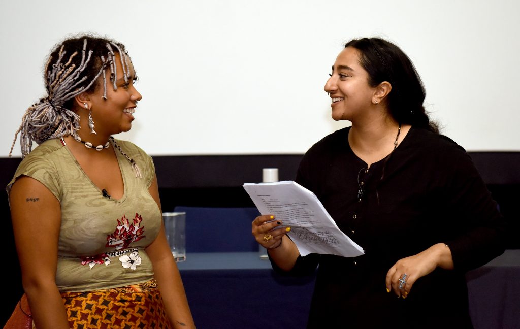 Female actors playing Elna and Maring at the conference