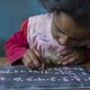 Opinion: The World Bank shouldn’t be setting global goals for education A girl practices numbers in primary school in Laayoune refugee camp in Tindouf, Algeria. Photo by: ©2018 European Union / Louiza Ammi / CC BY-NC-ND