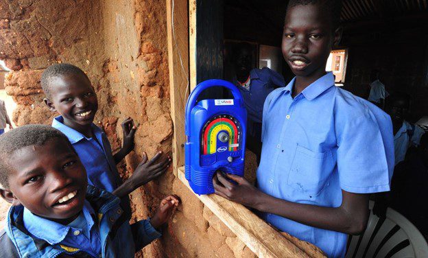 African boys with a radio