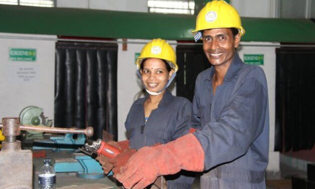 Engineers in yellow hard hats