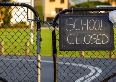 Locked gates with School Closed notice