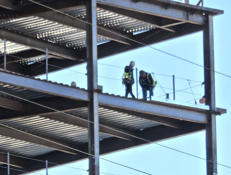 Men on building project of a steel structure