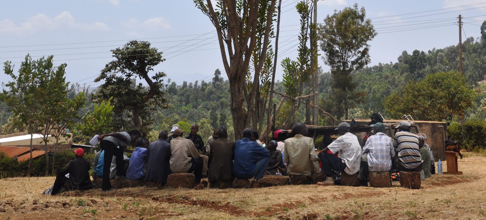 Farmers meeting under a tree in Kenya 