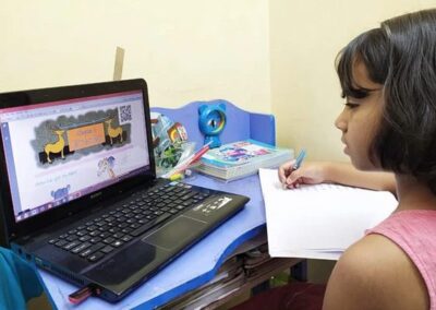 Girl working at home with a laptop computer