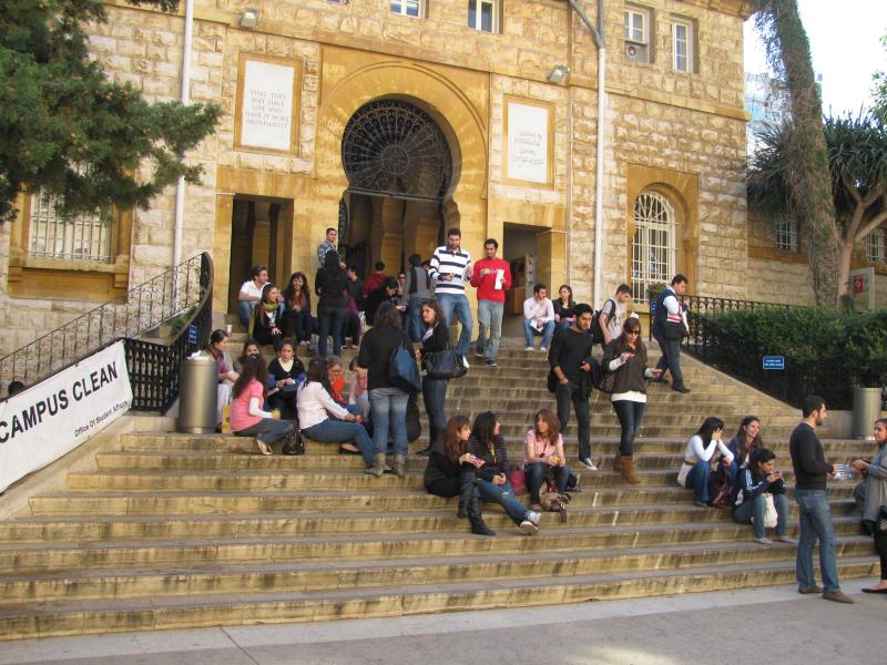 Students on the steps of a HE building in Lebanon