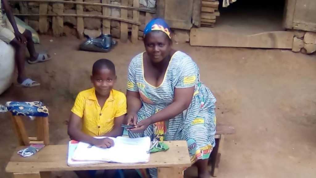 Zambo, who has spina bifida is learning at home in Cameroon