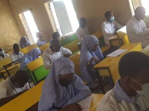 Class in Nigeria with students wearing masks