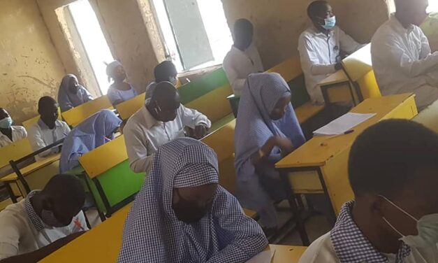 Class in Nigeria with students wearing masks