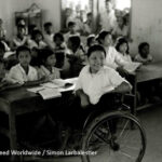 classroom scene with child in wheelchair