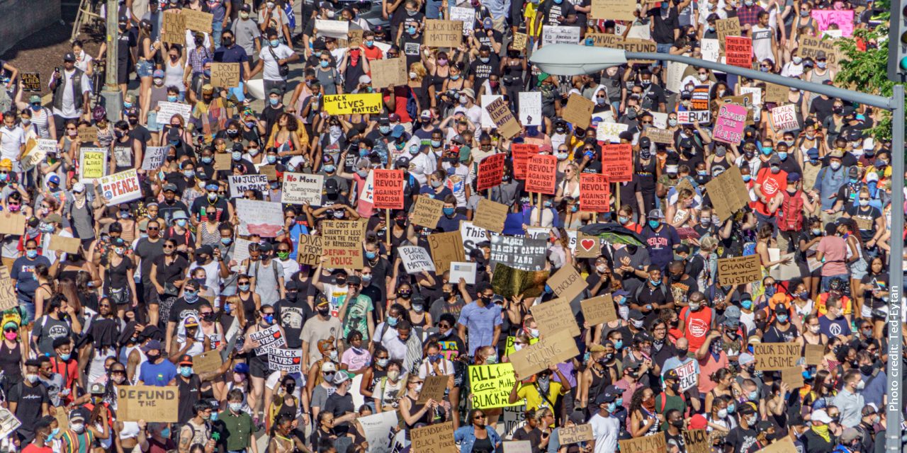 Group of people protesting at murder of George Floyd in Washington DC