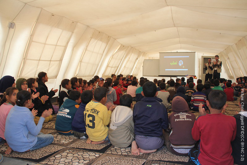 Chiildren in temporary classroom in a refugee camp