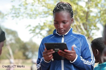 Student holding a mobile device