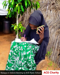 Girl working while listening to school radio