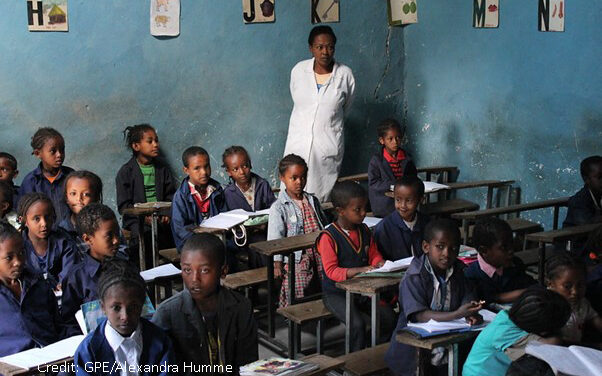 Primary school teacher in her class